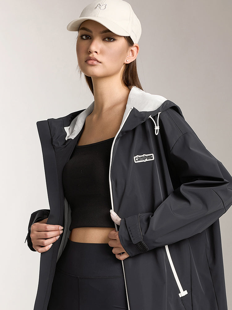 chaqueta cortavientos con capucha y doble cremallera