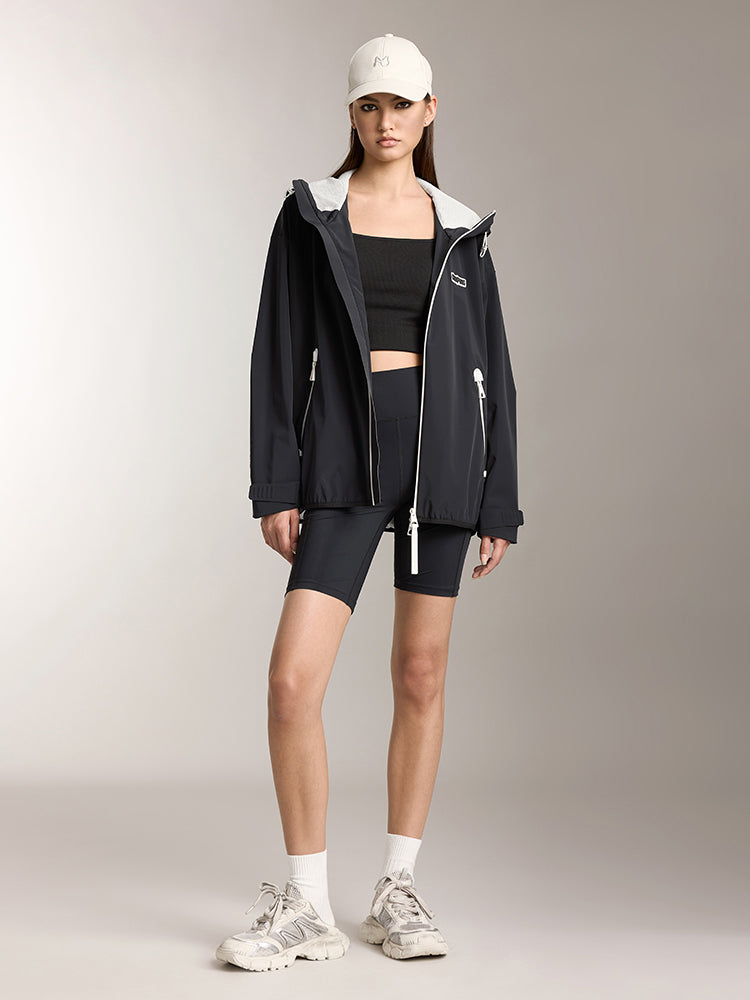 chaqueta cortavientos con capucha y doble cremallera
