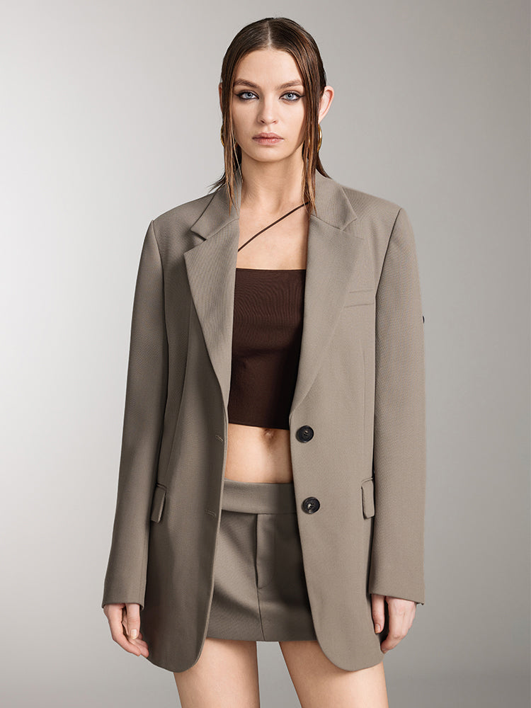 chaqueta de traje holgada de botonadura sencilla