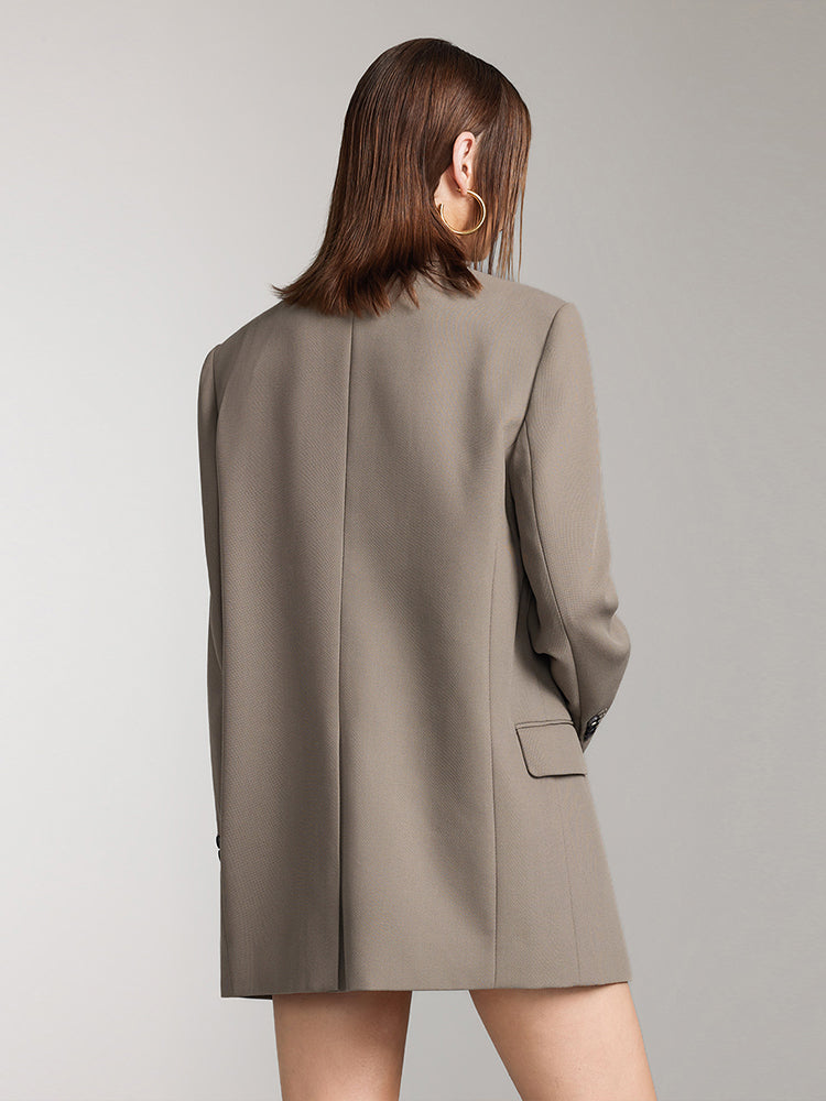 chaqueta de traje holgada de botonadura sencilla