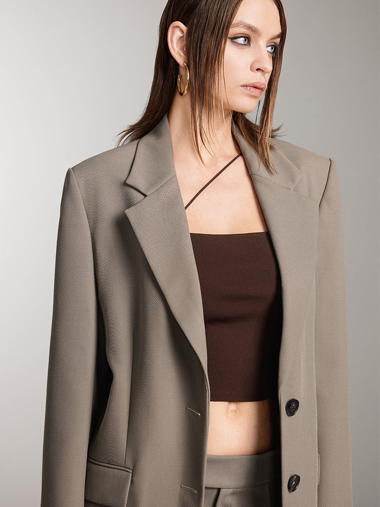 chaqueta de traje holgada de botonadura sencilla