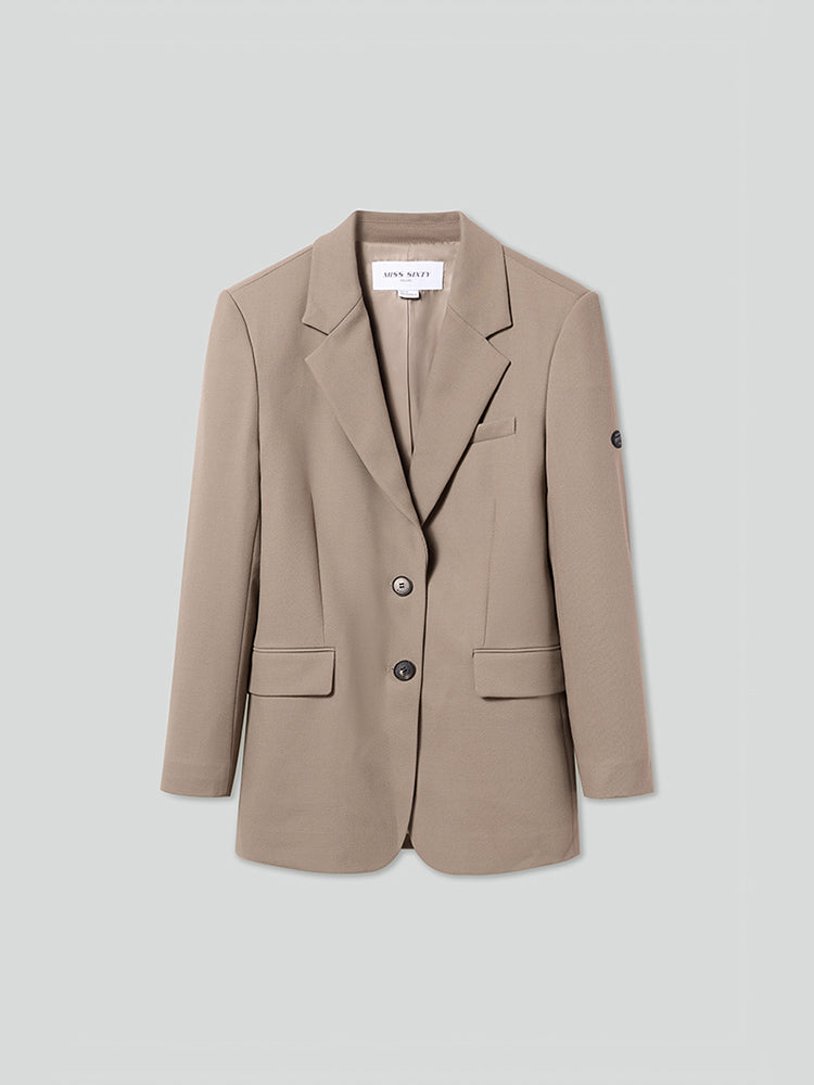 chaqueta de traje holgada de botonadura sencilla