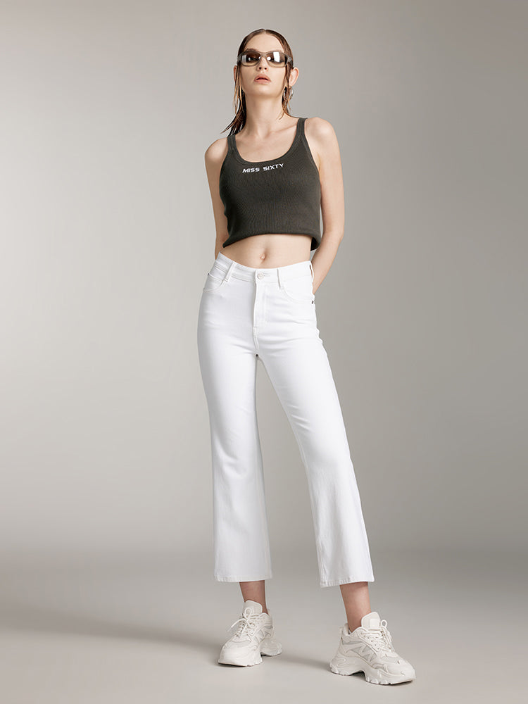 pantalones blancos de corte acampanado con seda morera