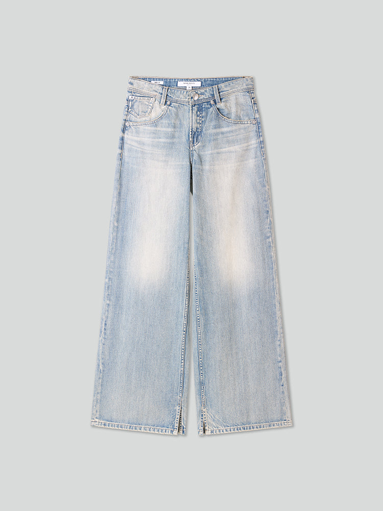 vaqueros desgastados de pierna ancha de color azul claro