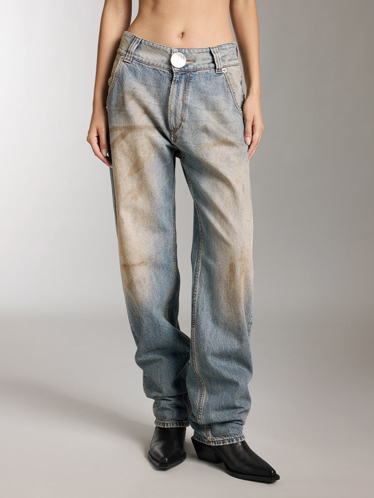 vaqueros desgastados estilo wasteland