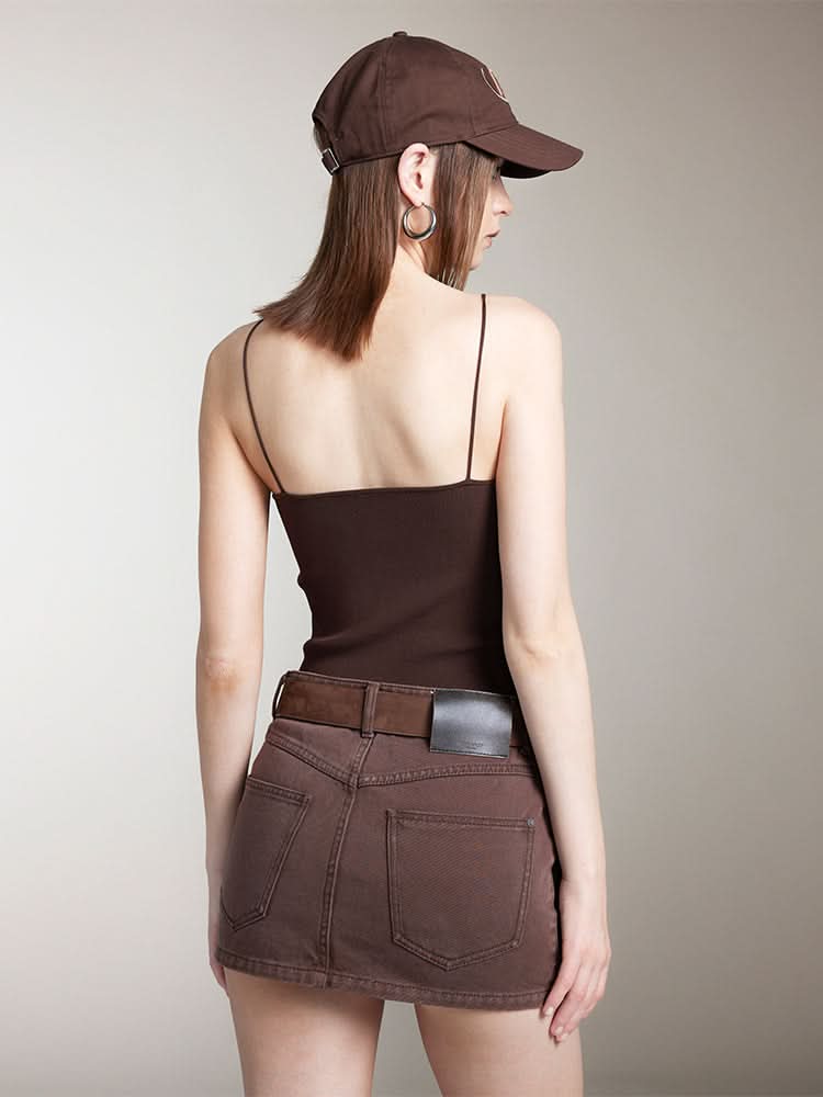 camisola inclinada