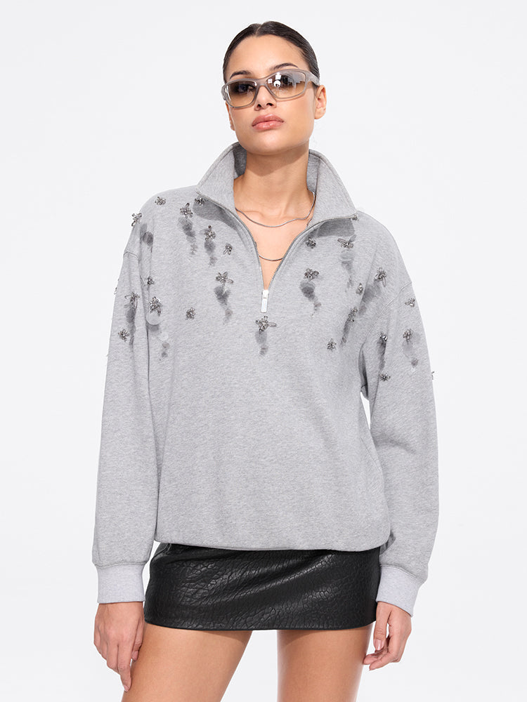 jersey de cuello alto con cuentas
