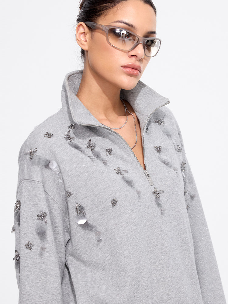 jersey de cuello alto con cuentas