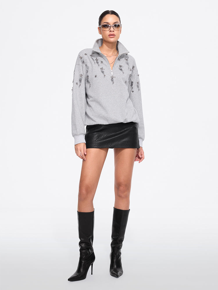 jersey de cuello alto con cuentas