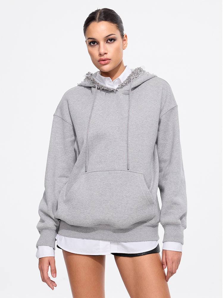 sudadera con capucha y adorno de cuentas