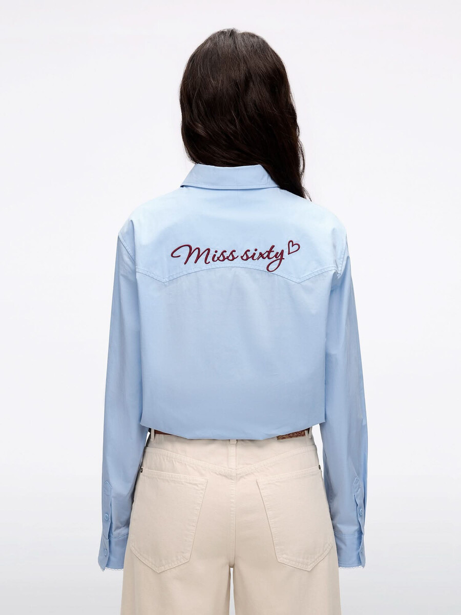 camisa bordada con cuentas