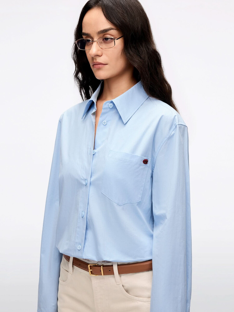 camisa bordada con cuentas
