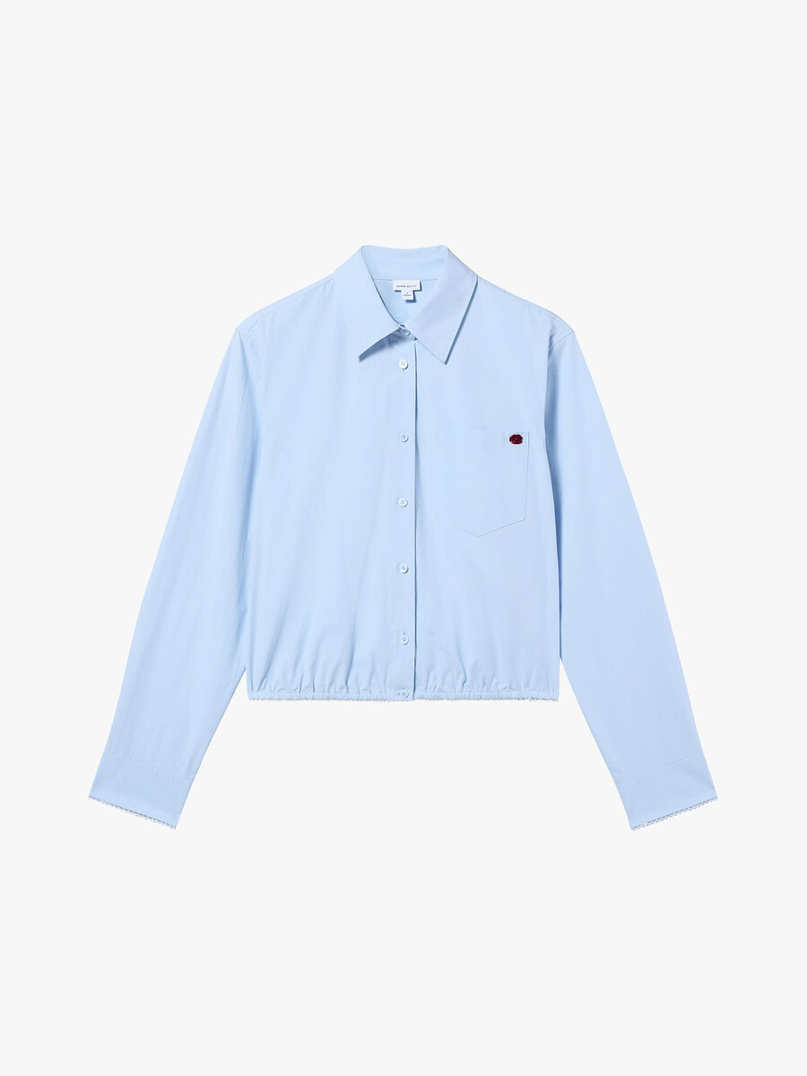 camisa bordada con cuentas
