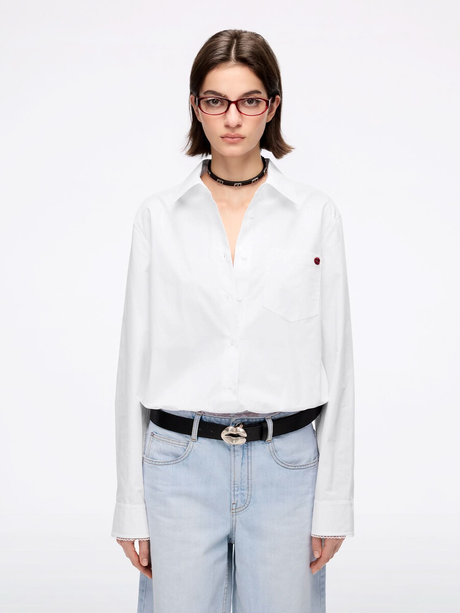 camisa bordada con cuentas