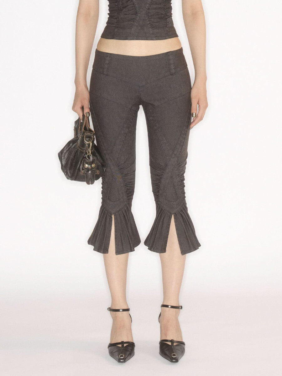 pantalones acampanados con abertura